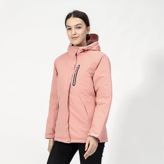 DEFROST - Heated Jacket in pink worn by a woman