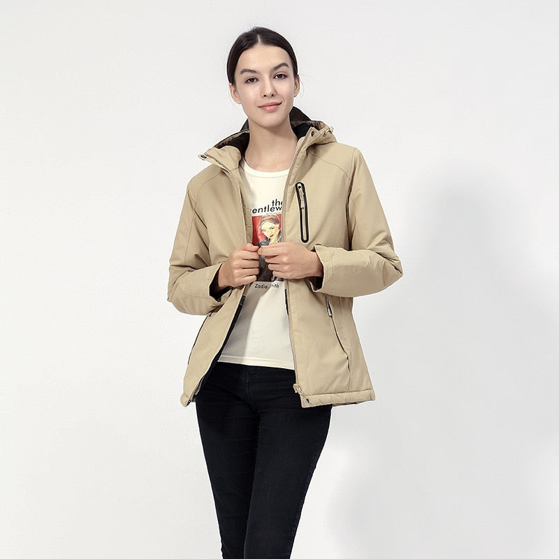 DEFROST - Heated Jacket in khaki worn by a woman